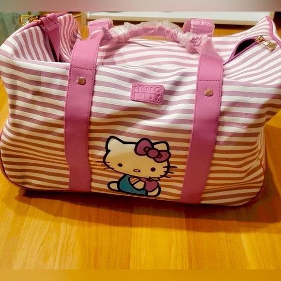 Hello Kitty Handbags - NEW! Sanrio Hello Kitty Bioworld Rolling Duffle Luggage Carry-On Travel Bag NWT